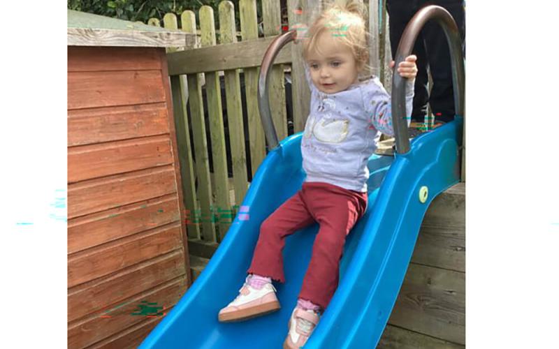 Child going down a slide